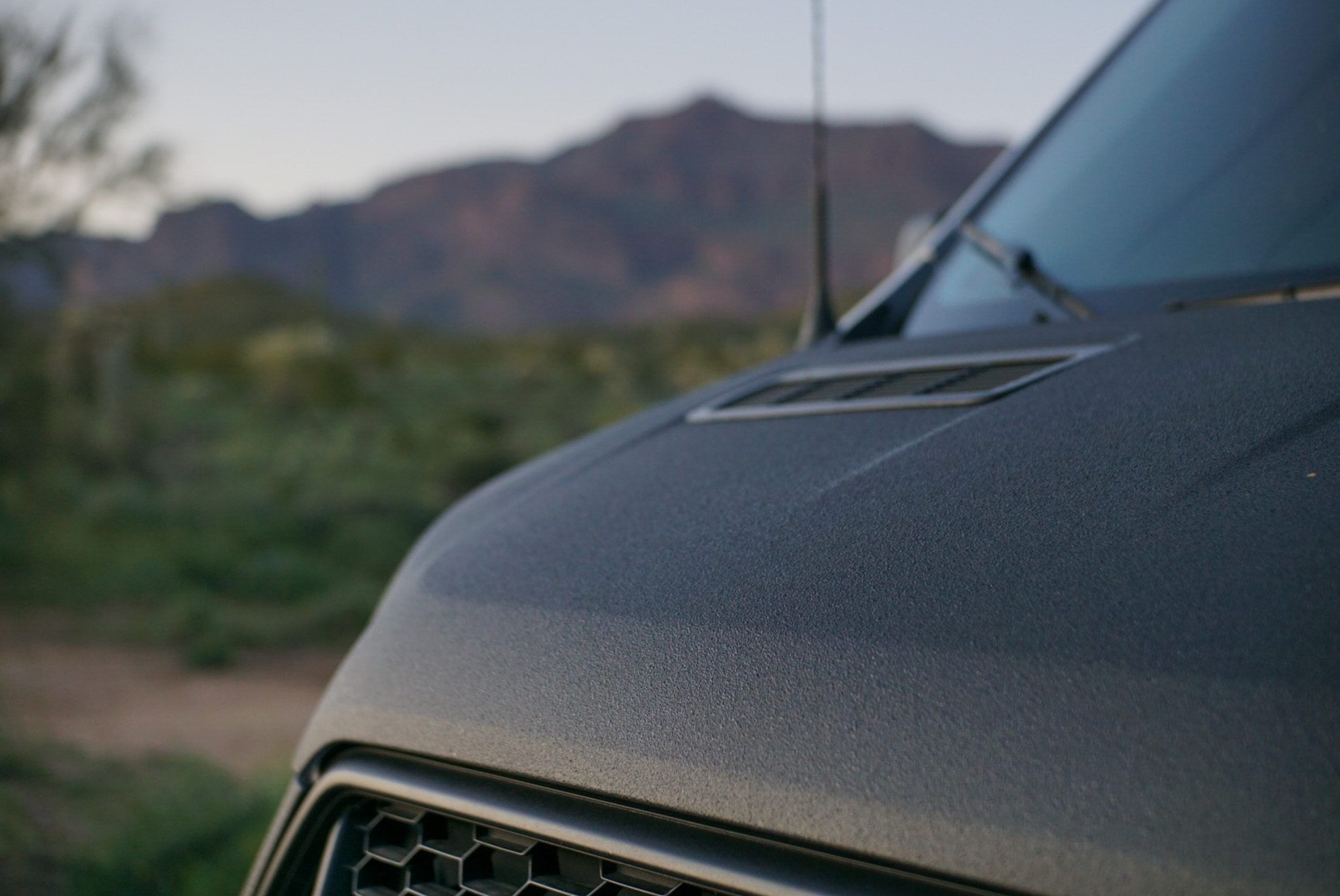 How & Why to Use Raptor Bed Liner on Your Camper Van Conversion