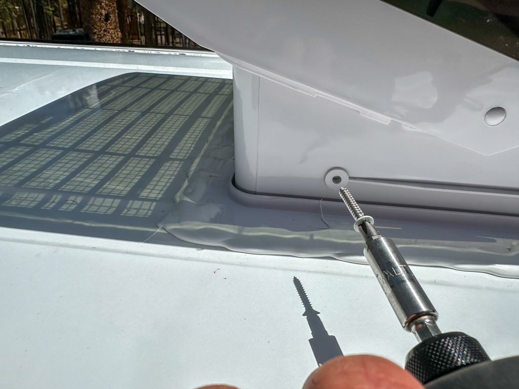 Step by Step Guide to Installing a Maxx Air fan on a DIY camper van: attach fan to flange